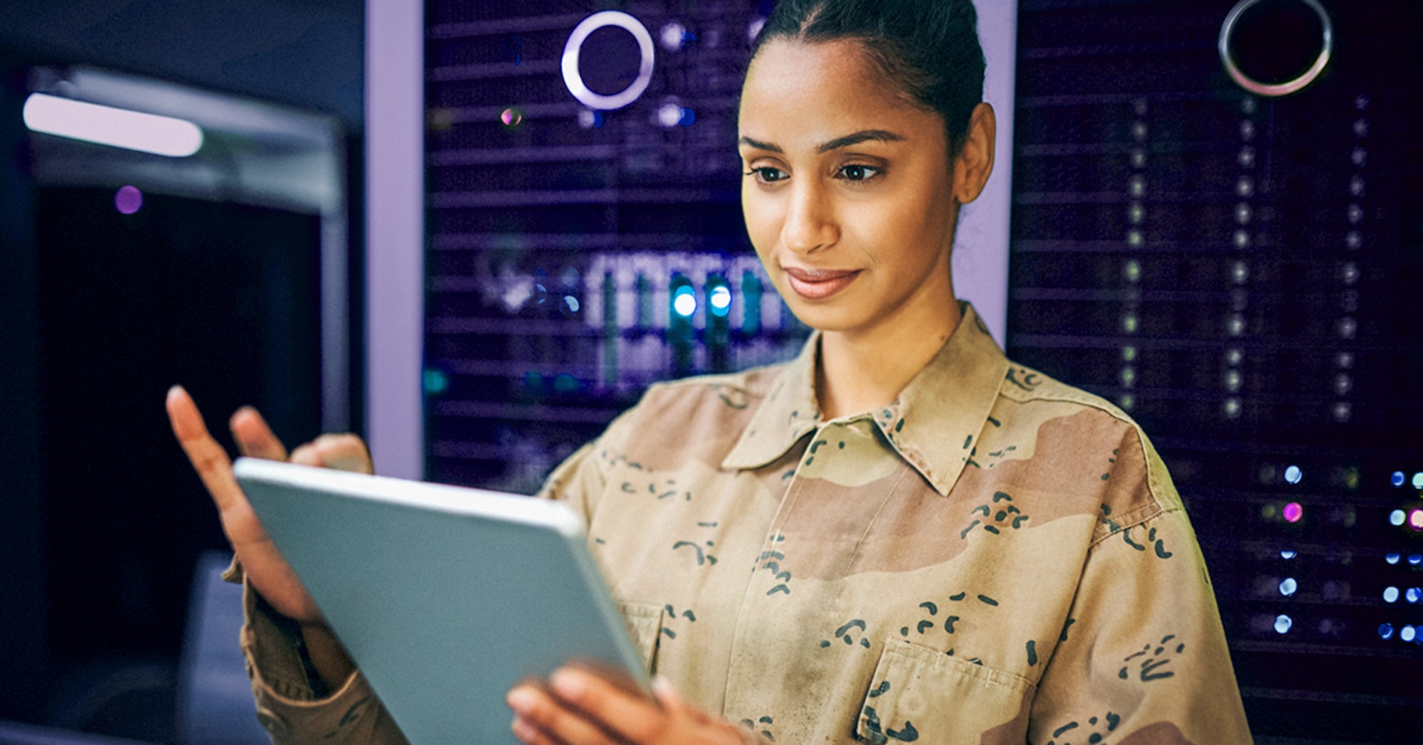 Military woman using a tablet