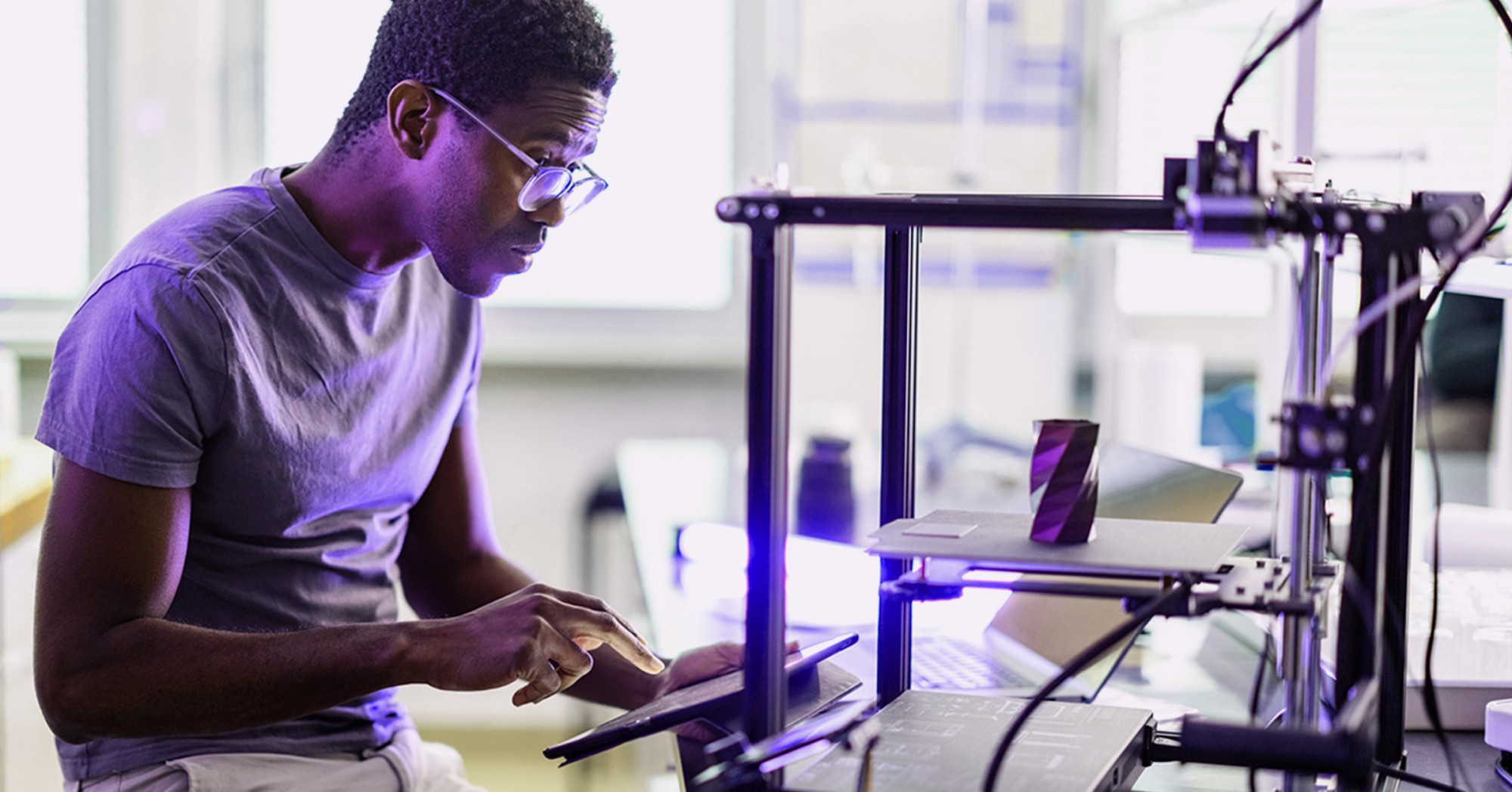 Man using a 3D printer