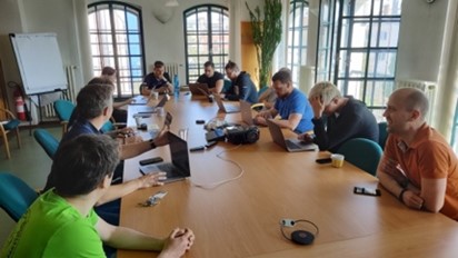 group of people working at a confrence table