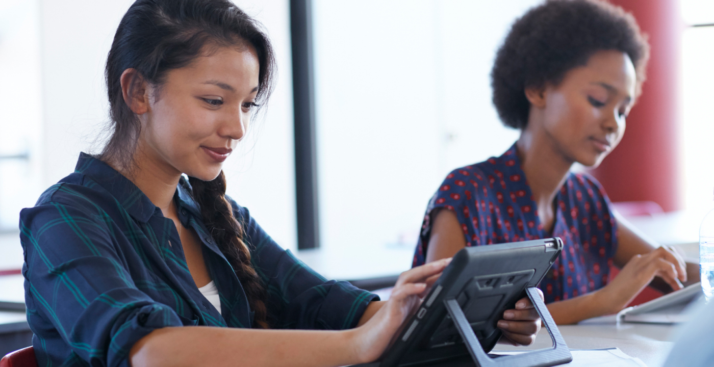 Women working on iPads