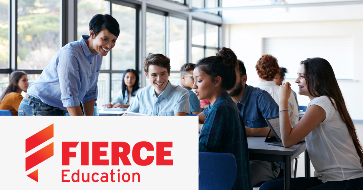 Image of a group of students interacting with a teacher with the Fierce Education logo placed on the left lower corner. 