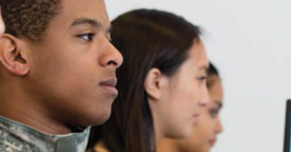 Government employees at desktop computers taking online training courses